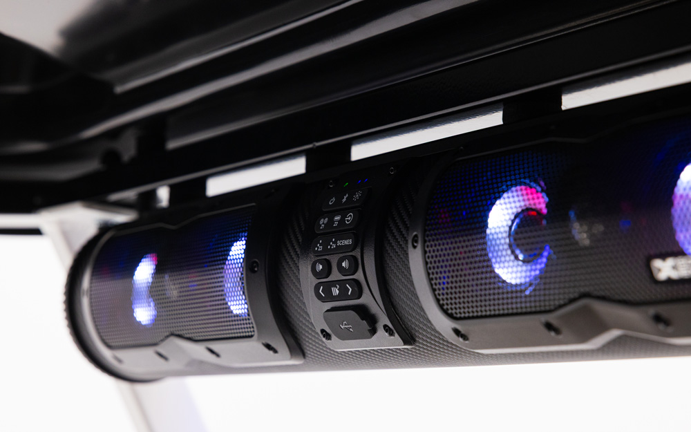 Close-up of the Boulevard’s overhead EcoXGear soundbar with illuminated speakers